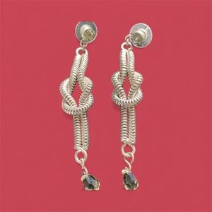 Stunning silver/gunmetal earring, with smoky CZ on the ear and at the "bottom"